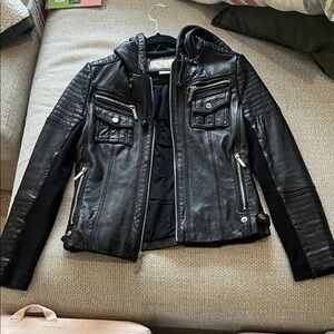 Genuine Black leather hooded Michael Kors Jacket with silver hardware.